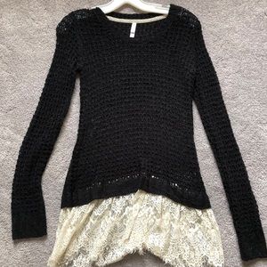 Two sweaters with lace inlay at the bottom